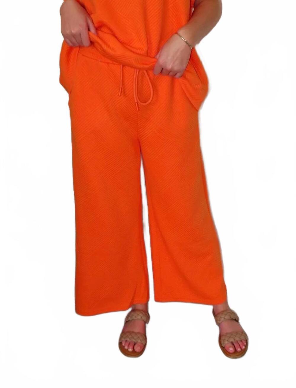 NEW SEE AND BE SEEN rae lounge pants in orange